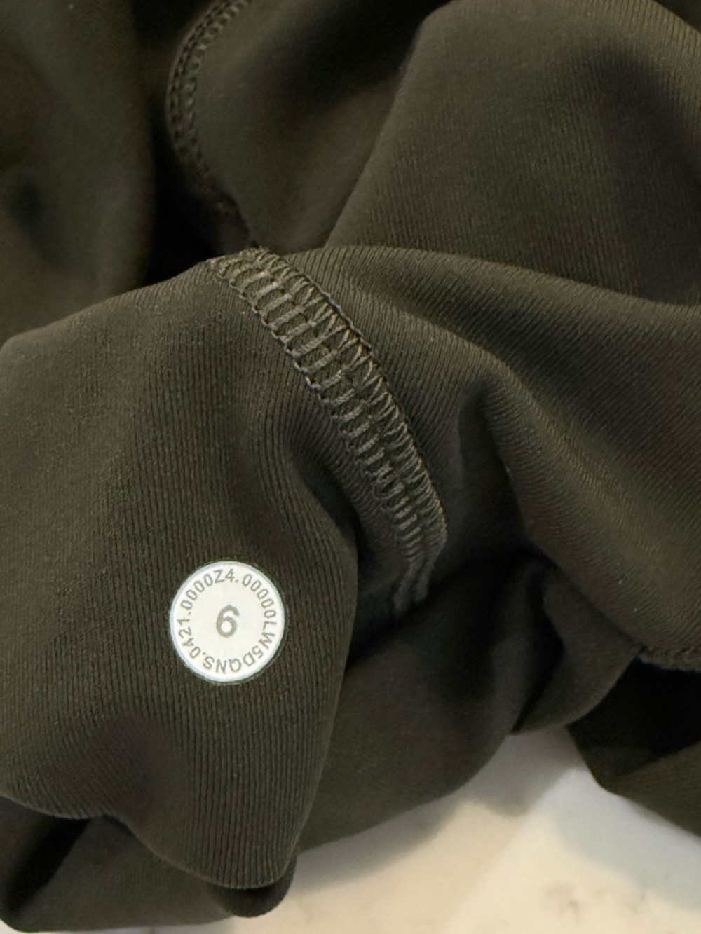Lululemon Athletica Olive Green Leggings, side pockets and zip back pockets - Picture 16 of 16
